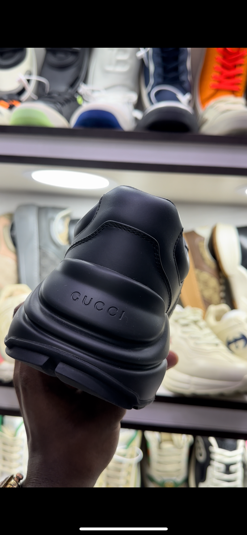 Gucci - RHYTON couro GG
